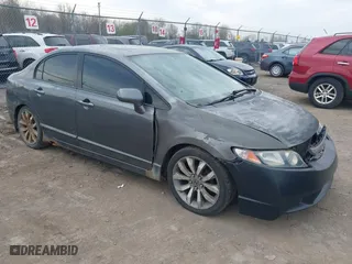 2010 Honda Civic Sdn EX with VIN 2HGFA1F84AH523448, listed as a IAAI auction lot 42132758 with 235,827 mi miles. Bid and sale history available at carsss.com. Image 1.