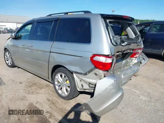 2005 Honda Odyssey EX z VIN 5FNRL38465B411189, wystawiony jako IAAI lot #42310199 z przebiegiem 304 142 mil mil oraz . Historia ofert i sprzedaży dostępna na DreamBid. Obrazek 3.
