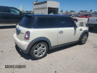 2011 MINI Hardtop with VIN WMWSU3C58BT182034, listed as a Copart auction lot 57964385 with 95,072 mi miles and Clean title. Bid and sale history available at DreamBid. Image 3.
