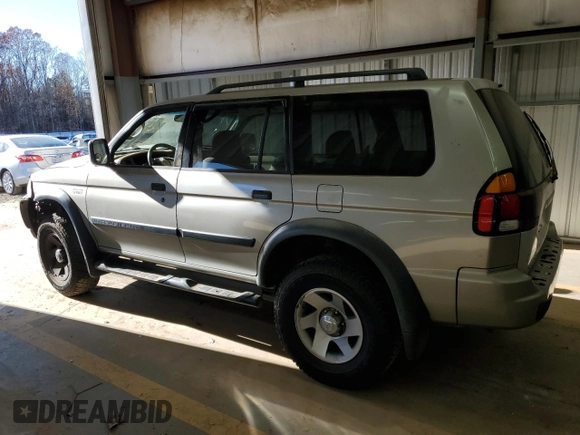 2002 Mitsubishi Montero ES z VIN JA4LS21H32J058330, wystawiony jako Copart lot #83523844 z przebiegiem 186 781 mil mil oraz Szkoda całkowita • Salvage title. Historia ofert i sprzedaży dostępna na DreamBid. Obrazek 2.