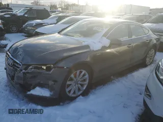 2015 Audi A7 z VIN WAU2GBFC8FN003920, wystawiony jako Copart lot #85489104 z przebiegiem 123 352 mil mil oraz Szkody całkowita. Historia ofert i sprzedaży dostępna na DreamBid. Obrazek 1.