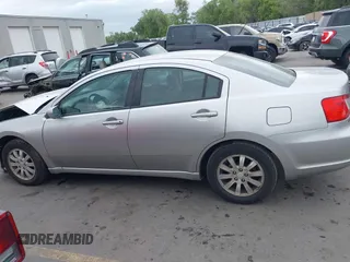 2009 Mitsubishi Galant ES z VIN 4A3AB36F19E007905, wystawiony jako IAAI lot #42249625 z przebiegiem 149 013 mil mil oraz . Historia ofert i sprzedaży dostępna na DreamBid. Obrazek 14.