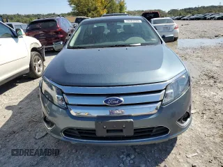 2012 Ford Fusion Hybrid with VIN 3FADP0L33CR258753, listed as a Copart auction lot 74201724 with 158,434 mi miles and Salvage title. Bid and sale history available at DreamBid. Image 5.