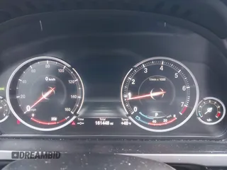 2014 BMW 7 Series 740i with VIN WBAYA6C51ED144387, listed as a IAAI auction lot 41226638 with 161,448 mi miles. Bid and sale history available at carsss.com. Image 7.