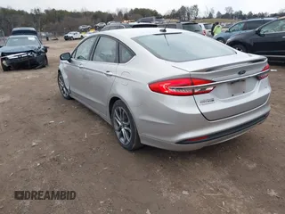 2017 Ford Fusion SE z VIN 3FA6P0H78HR174956, wystawiony jako IAAI lot #41258610 z przebiegiem 70 180 mil mil oraz . Historia ofert i sprzedaży dostępna na DreamBid. Obrazek 3.