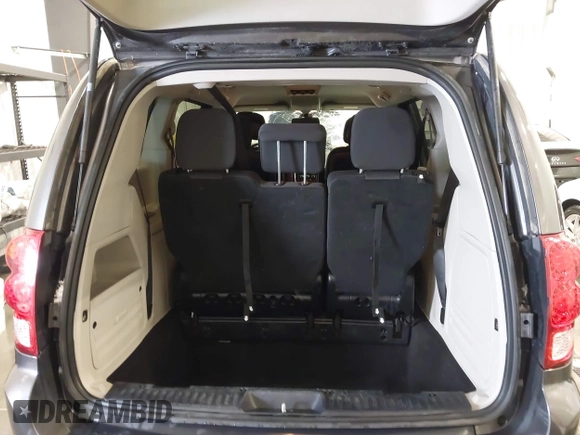 2019 Dodge Grand Caravan SE with VIN 2C4RDGBG9KR527770, listed as a IAAI auction lot 41571473 with 101,310 mi miles and . Bid and sale history available at DreamBid. Image 18.
