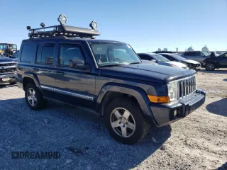 2010 Jeep Commander Sport z VIN 1J4RG4GT8AC139104, wystawiony jako Copart lot #84720134 z przebiegiem 167 646 mil mil oraz Szkoda całkowita • Salvage title. Historia ofert i sprzedaży dostępna na DreamBid. Obrazek 4.