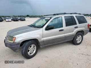 2003 Jeep Grand Cherokee Laredo with VIN 1J4GX48S13C609036, listed as a Copart auction lot 63143505 with 127,188 mi miles and Clean title. Bid and sale history available at DreamBid. Image 1.