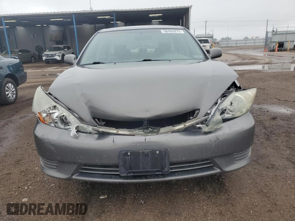 2005 Toyota Camry LE z VIN 4T1BE30K05U579984, wystawiony jako Copart lot #58482875 z przebiegiem 74 638 mil mil oraz Szkoda całkowita • Salvage title. Historia ofert i sprzedaży dostępna na DreamBid. Obrazek 5.