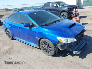 2015 Subaru WRX with VIN JF1VA1A60F9825977, listed as a IAAI auction lot 42059651 with 137,234 mi miles and . Bid and sale history available at DreamBid. Image 1.