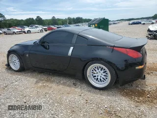 2003 Nissan 350Z Touring z VIN JN1AZ34E53T005833, wystawiony jako Copart lot #55437345 z przebiegiem 144 141 mil mil oraz Szkoda całkowita • Salvage title. Historia ofert i sprzedaży dostępna na DreamBid. Obrazek 2.