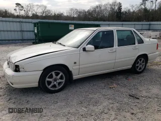 2000 Volvo S70 z VIN YV1LS61J5Y2633332, wystawiony jako Copart lot #46579235 z przebiegiem 124 889 mil mil oraz Szkoda całkowita • Salvage title. Historia ofert i sprzedaży dostępna na DreamBid. Obrazek 1.