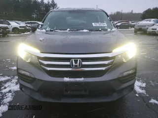 2017 Honda Pilot EX-L with VIN 5FNYF6H54HB008054, listed as a Copart auction lot 82758704 with 124,024 mi miles and Salvage Title. Bid and sale history available at DreamBid. Image 5.