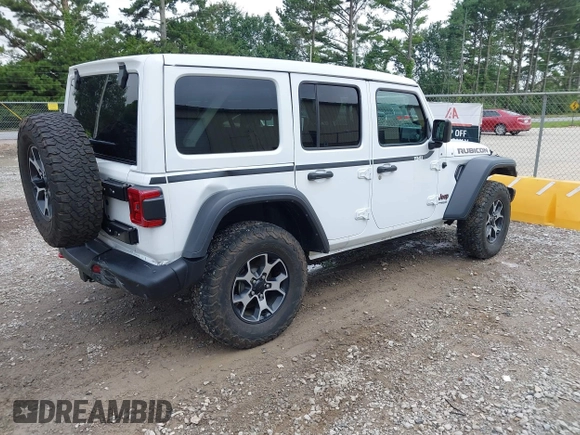 2021 Jeep Wrangler Unlimited Rubicon with VIN 1C4JJXFM9MW774142, listed as a IAAI auction lot 42625007 with 42,318 mi miles and . Bid and sale history available at DreamBid. Image 4.