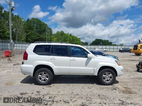 2005 Lexus GX 470 z VIN JTJBT20X350075577, wystawiony jako IAAI lot #42534615 z przebiegiem 233 329 mil mil oraz . Historia ofert i sprzedaży dostępna na DreamBid. Obrazek 13.