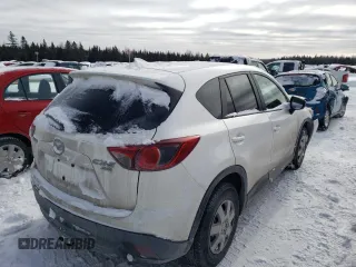 2016 Mazda CX-5 Touring z VIN JM3KE4CY1G0703496, wystawiony jako Copart lot #43806525 z przebiegiem Nie podano mil oraz Szkoda całkowita • Salvage title. Historia ofert i sprzedaży dostępna na DreamBid. Obrazek 3.