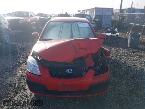 2009 Kia Rio LX with VIN KNADE223796485606, listed as a IAAI auction lot 41676881 with 58,852 mi miles and . Bid and sale history available at DreamBid. Image 12.