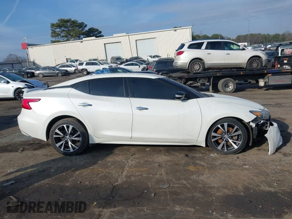 2016 Nissan Maxima SL with VIN 1N4AA6AP2GC387004, listed as a IAAI auction lot 41504524 with 95,437 mi miles and . Bid and sale history available at DreamBid. Image 12.