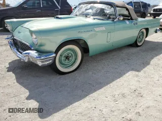1957 Ford Thunderbird with VIN D7FH182410, listed as a Copart auction lot 77671374 with 319 mi miles and Salvage Title. Bid and sale history available at DreamBid. Image 1.