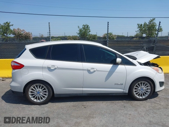 2013 Ford C-Max SE z VIN 1FADP5AU1DL518916, wystawiony jako IAAI lot #42452252 z przebiegiem 250 862 mil mil oraz . Historia ofert i sprzedaży dostępna na DreamBid. Obrazek 14.