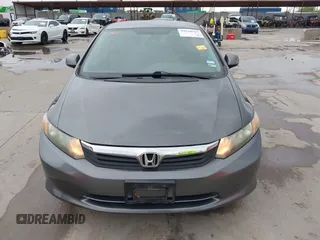 2012 Honda Civic LX z VIN 2HGFB2F51CH600546, wystawiony jako IAAI lot #41920265 z przebiegiem 196 599 mil mil oraz . Historia ofert i sprzedaży dostępna na DreamBid. Obrazek 12.