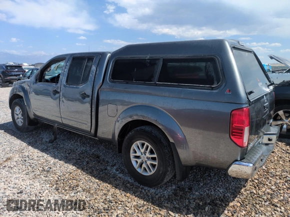 2016 Nissan Frontier SV with VIN 1N6AD0FV5GN780728, listed as a Copart auction lot 59890745 with 135,059 mi miles and Salvage title. Bid and sale history available at DreamBid. Image 2.