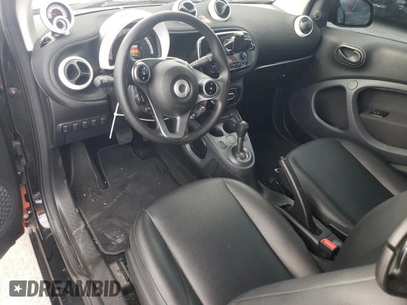 2016 Smart fortwo Passion z VIN WMEFJ5DAXGK069026, wystawiony jako Copart lot #53535045 z przebiegiem 34 410 mil mil oraz Tytuł czysty. Historia ofert i sprzedaży dostępna na DreamBid. Obrazek 8.