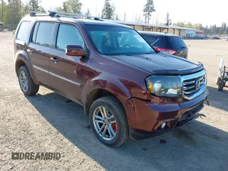 2014 Honda Pilot Touring with VIN 5FNYF4H93EB502117, listed as a IAAI auction lot 42086774 with 111,003 mi miles and . Bid and sale history available at carsss.com. Image 1.