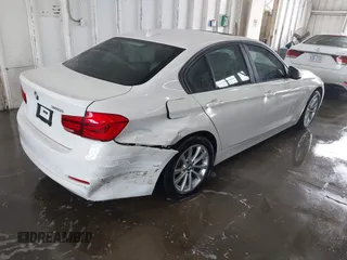 2018 BMW 3 Series 320i with VIN WBA8A9C57JAH13937, listed as a IAAI auction lot 41979917 with 268,115 mi miles. Bid and sale history available at carsss.com. Image 4.