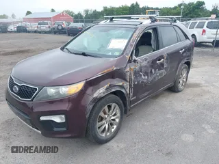 2012 Kia Sorento SX with VIN 5XYKWDA2XCG237950, listed as a IAAI auction lot 42576973 with 205,951 mi miles and . Bid and sale history available at DreamBid. Image 2.