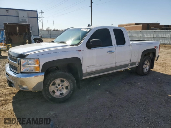 2012 Chevrolet Silverado 1500 LT with VIN 1GCRKSE7XCZ219549, listed as a Copart auction lot 51901435 with 214,051 mi miles and Salvage Title. Bid and sale history available at DreamBid. Image 1.