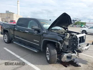 2014 GMC Sierra 1500 SLT with VIN 3GTU2VEC9EG428809, listed as a IAAI auction lot 42780648 with 170,828 mi miles and . Bid and sale history available at DreamBid. Image 1.