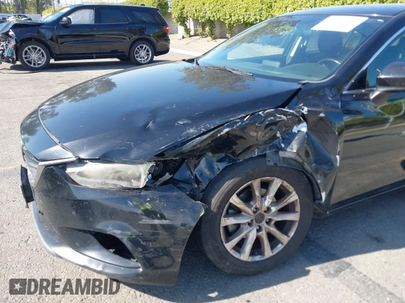 2016 Mazda 6 i Sport with VIN JM1GJ1U51G1445925, listed as a IAAI auction lot 41980386 with Not Provided miles and . Bid and sale history available at DreamBid. Image 6.