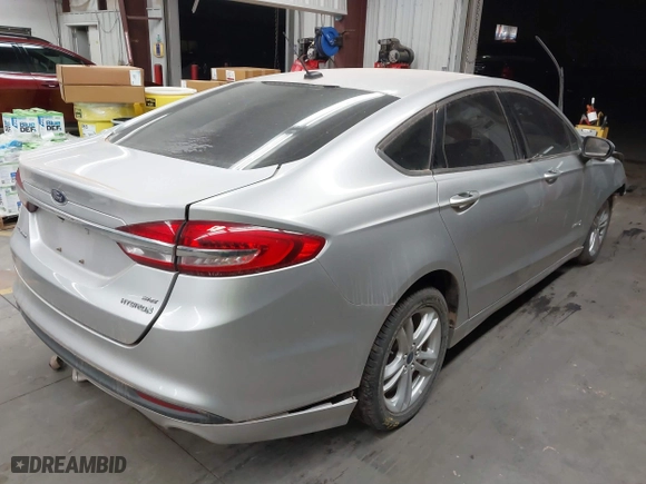 2018 Ford Fusion Hybrid SE with VIN 3FA6P0LUXJR170152, listed as a IAAI auction lot 41467621 with 150,048 mi miles. Bid and sale history available at carsss.com. Image 4.