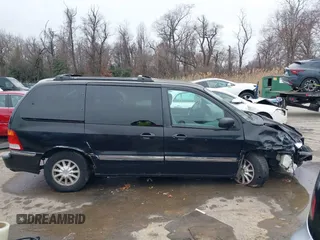 1999 Ford Windstar SE with VIN 2FMDA5243XBC41132, listed as a IAAI auction lot 41575559 with 240,497 mi miles and . Bid and sale history available at carsss.com. Image 13.