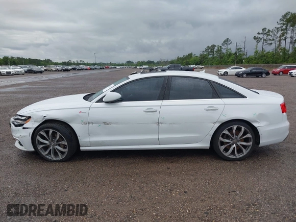 2013 Audi A6 Prestige with VIN WAUHGAFC2DN153202, listed as a IAAI auction lot 42242052 with 163,295 mi miles and . Bid and sale history available at DreamBid. Image 14.