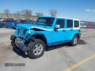 2017 Jeep Wrangler Unlimited Sahara with VIN 1C4BJWEG8HL655998, listed as a IAAI auction lot 41906919 with 100,350 mi miles and . Bid and sale history available at DreamBid. Image 2.