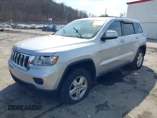 2013 Jeep Grand Cherokee Laredo with VIN 1C4RJFAG5DC634685, listed as a IAAI auction lot 41792147 with 260,594 mi miles. Bid and sale history available at carsss.com. Image 17.