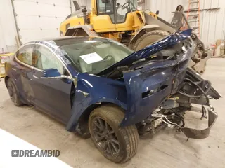 2018 Tesla Model 3 Long Range Battery with VIN 5YJ3E1EB7JF086201, listed as a IAAI auction lot 41965193 with 99,231 mi miles and . Bid and sale history available at DreamBid. Image 1.