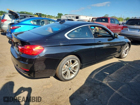 2016 BMW 4 Series 428i xDrive with VIN WBA3N9C52GK249387, listed as a Copart auction lot 65697805 with 203,385 mi miles and Clean title. Bid and sale history available at DreamBid. Image 3.