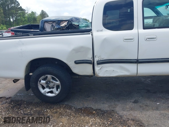 2001 Toyota Tundra SR5 with VIN 5TBRN34161S216827, listed as a IAAI auction lot 41942730 with 204,185 mi miles and . Bid and sale history available at DreamBid. Image 6.
