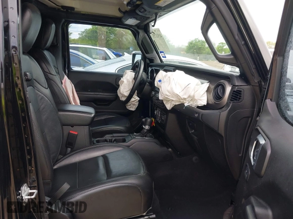 2021 Jeep Gladiator Freedom z VIN 1C6HJTAG4ML586999, wystawiony jako IAAI lot #41911751 z przebiegiem 81 030 mil mil oraz . Historia ofert i sprzedaży dostępna na DreamBid. Obrazek 5.