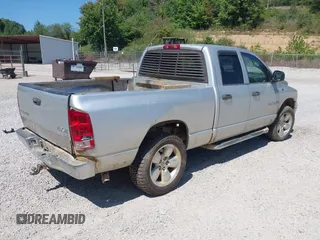 2004 Dodge 1500 SLT with VIN 1D7HU18N14S725944, listed as a IAAI auction lot 40163214 with 238,936 mi miles and . Bid and sale history available at carsss.com. Image 4.