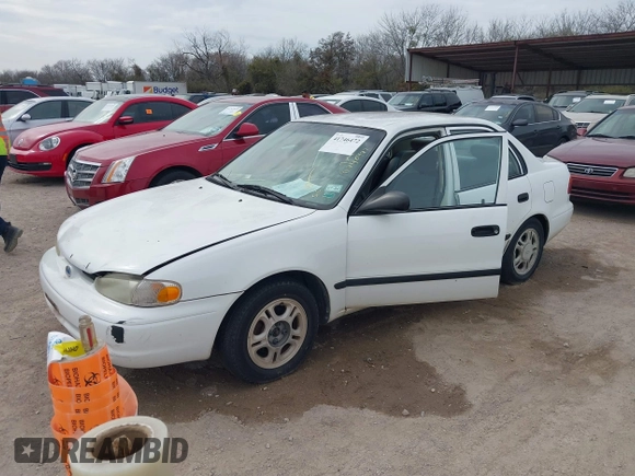 1999 Chevrolet Prizm z VIN 1Y1SK5487XZ439374, wystawiony jako IAAI lot #41746472 z przebiegiem 152 674 mil mil oraz . Historia ofert i sprzedaży dostępna na DreamBid. Obrazek 2.