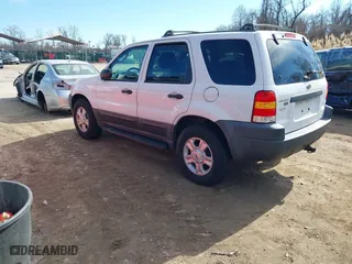 2003 Ford Escape XLT Popular 2 with VIN 1FMCU93163KB78008, listed as a IAAI auction lot 41660779 with 153,898 mi miles. Bid and sale history available at carsss.com. Image 3.