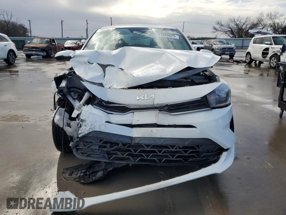 2022 Kia Rio LX with VIN 3KPA24AD5NE503710, listed as a Copart auction lot 47686025 with 77,758 mi miles and Salvage Title. Bid and sale history available at DreamBid. Image 5.