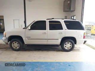 2004 GMC Yukon SLE z VIN 1GKEC13V64R107506, wystawiony jako IAAI lot #41407353 z przebiegiem 215 127 mil mil oraz . Historia ofert i sprzedaży dostępna na DreamBid. Obrazek 14.