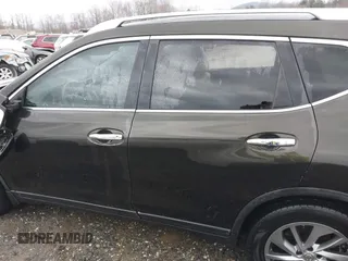 2015 Nissan Rogue SL with VIN 5N1AT2MVXFC911260, listed as a IAAI auction lot 41823690 with 128,121 mi miles. Bid and sale history available at carsss.com. Image 13.