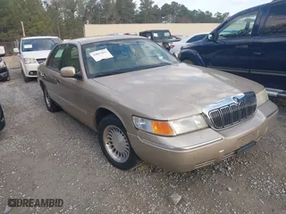 2000 Mercury Grand Marquis LS with VIN 2MEFM75W3YX715208, listed as a IAAI auction lot 41837011 with 137,868 mi miles. Bid and sale history available at carsss.com. Image 1.