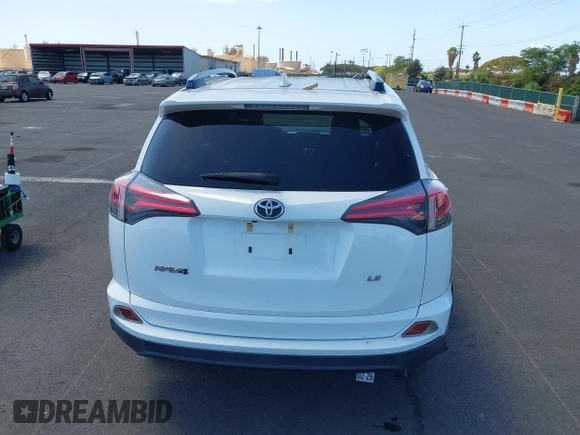 2017 Toyota RAV4 LE with VIN JTMZFREV2HJ721392, listed as a IAAI auction lot 41697170 with 59,357 mi miles and . Bid and sale history available at carsss.com. Image 16.
